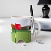 image:imageKikkerland Putting Golf Mug  Fun Desktop Golfing Set for Home amp Office  Includes Porcelain Cup with Hole Mini Golf Ball amp Pen with Club CapPutter