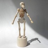 image:imageKikkerland Skeleton Lazy Bones Sculpture Tan