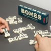 image:imageKikkerland Bones Bone Shaped Domino Set Classic Board Game 28 Tiles Fun FamilyFriendly Game Night for Adults and Kids Ages 8 and Up